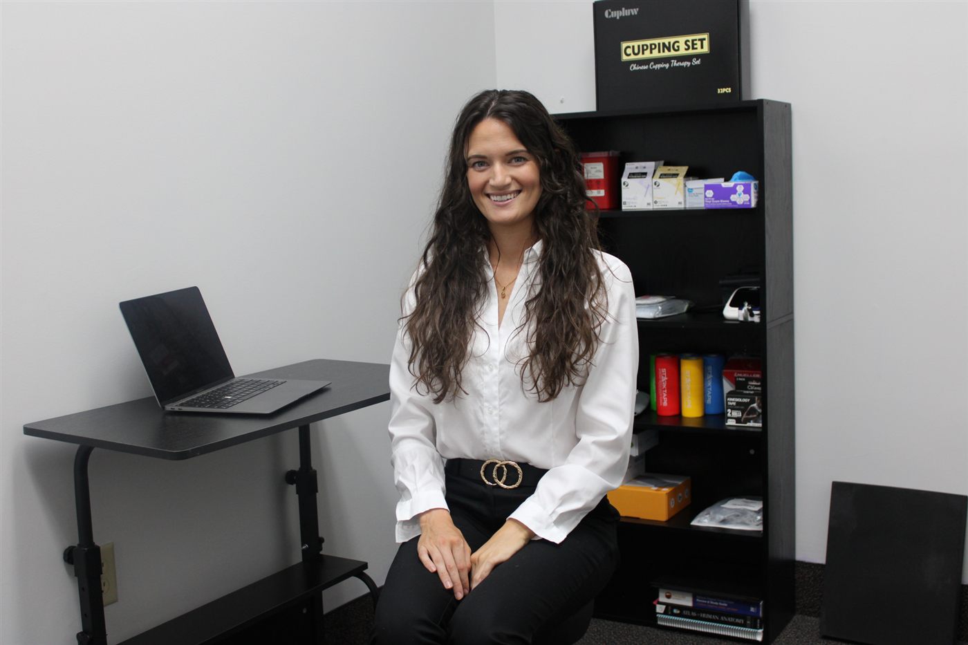 Dr. Tyler Joiner, seated in the Kinetic Healing clinic